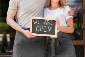 couple-reopening-small-business_23-2148604373