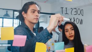 group-young-businessman-businesswoman-brainstorming-ideas-working-together_7861-3047-1