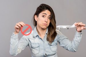 medium-shot-woman-holding-no-symbol_23-2148580948