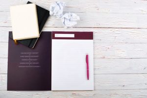 pink-pen-lies-white-notebook-white-floor_1304-2840-1