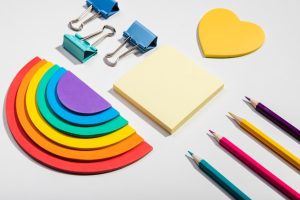post-it-note-cards-school-tools-rainbow-paper-high-view_23-2148362168