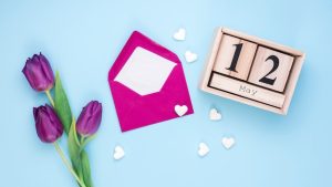 12-may-inscription-with-envelope-tulips_23-2148094205