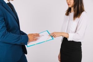 business-people-with-clipboard_23-2147708494