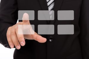 businessman-selecting-gray-square_1232-897