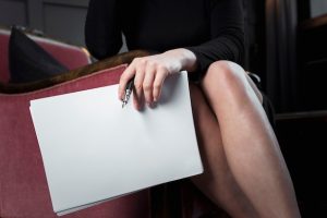 close-up-businesswoman-holding-papers_23-2148452622