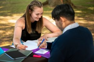 college-students-cramming-outdoor_23-2149649374