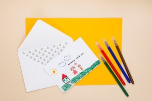 drawing-mother-child-with-envelope-pens_23-2148094164