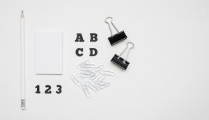 flat-lay-white-black-stationery-office-supplies_23-2148500443