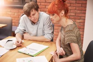 group-creative-people-analyzing-result-work_329181-15535