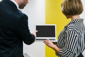 man-woman-with-laptop_23-2147787566