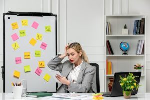 marketing-young-cute-blonde-girl-grey-suit-office-confused-looking-work-results_140725-165568