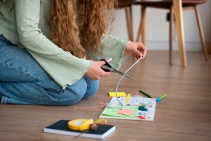 side-view-woman-doing-creative-journaling_23-2150447162