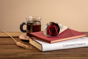 still-life-sant-jordi-day-books-roses_23-2151197531