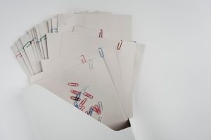 still-life-stacks-papers-documents_23-2151118324