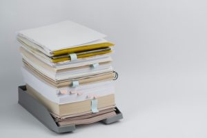 still-life-stacks-papers-documents_23-2151118406