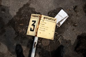 top-view-broken-sign-russian-s-war-ukraine_23-2149437930