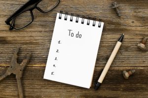 top-view-desk-top-with-list-notebook_23-2148443714