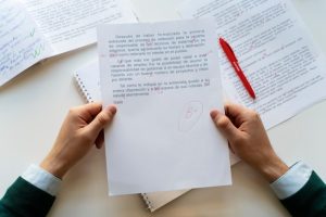 top-view-hands-holding-paper_23-2150171393-1