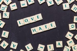 top-view-love-hate-word-black-background_23-2148101546