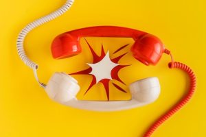 top-view-vintage-telephone-receivers-paper-shape_23-2148796035