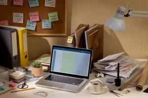 view-messy-office-workspace-with-laptop-device_23-2150282039