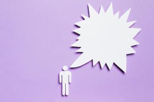 white-cardboard-man-thinking-violet-background_23-2148403575