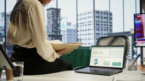 ambitious-woman-ceo-working-her-modern-corporate-office_482257-112516