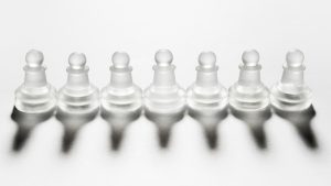 assortment-transparent-chess-pieces_23-2148198818