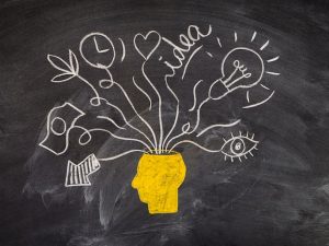chalkboard-drawing-head-idea-concept-designs_23-2148342861