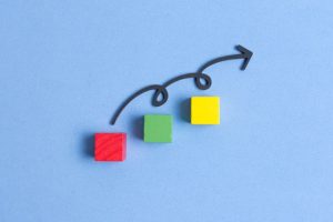 curvy-line-jumping-colourful-cubes_23-2148445418