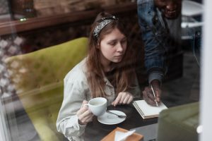 cute-woman-working-with-colleague_23-2148422433