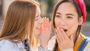 girlfriends-whispering_23-2148576779