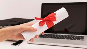graduation-diploma-certificate-laptop_23-2148769704