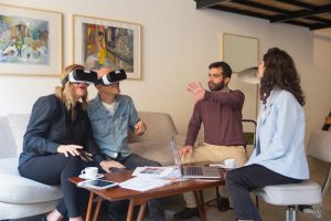 middle-aged-customers-enjoying-vr-experience_74855-2981