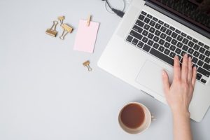 office-desktop-with-laptop-other-elements_23-2148196566