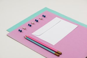 school-supplies-white-table_176420-4551