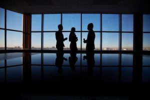 silhouettes-businesspeople-background_1098-938