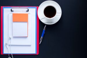 stack-notebooks-clipboard-near-pen-coffee_23-2147777890-2