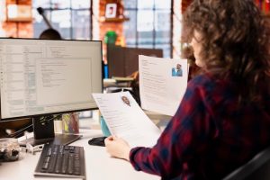 startup-hr-worker-identifying-right-candidates-job-opening-reviewing-resume_482257-125564-4