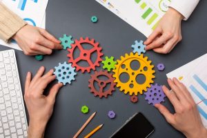 still-life-business-roles-with-various-mechanism-pieces_23-2149352652