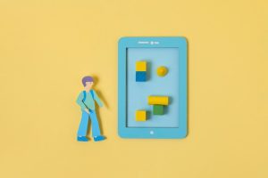 top-view-paper-man-with-wood-pieces_23-2149001206