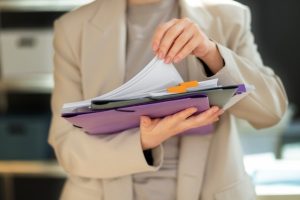 young-adult-organizing-documents_23-2149396630-7